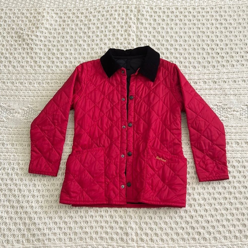 Gorgeous Barbour quilted jacket. Very gently used. Smoke free home. Snap buttons